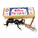 A Pelham cat puppet in associated Pelham box.