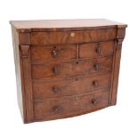 An early 19th century mahogany bowfronted chest of two short and three long drawers raised on