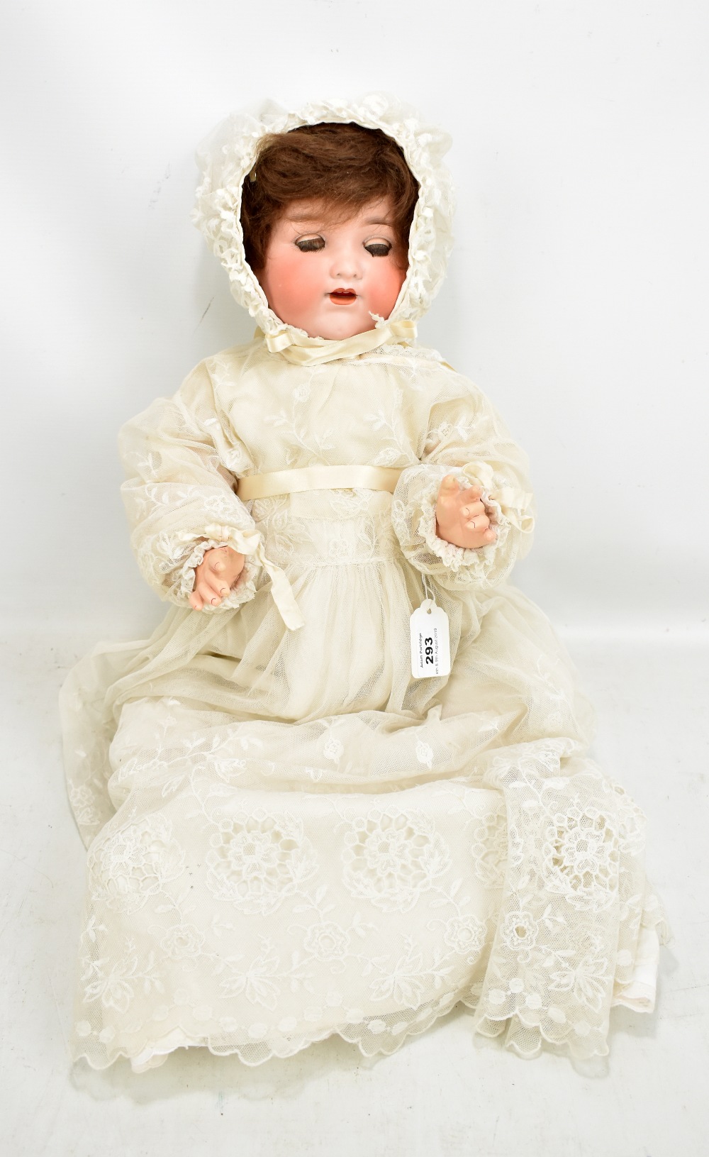 ARMAND MARSEILLE; a bisque headed doll with open/close blue glass eyes, open mouth with two upper