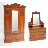 An Edwardian walnut wardrobe and dressing chest (2).