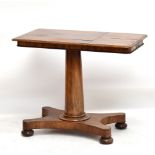 An early Victorian metamorphic reading/writing table with twin hinged end brackets set with