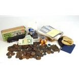 A small group of collectors' items including lighters, coins, stamps, etc.