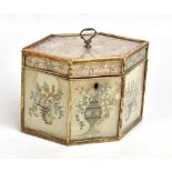 A circa 1780s lozenge shaped two division tea caddy, with silk embroidered panels depicting floral