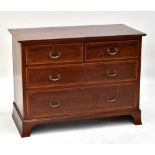 MAPLE & CO; an inlaid mahogany chest of two short and two long drawers.