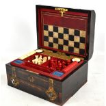 MAPPIN & WEBB; a mid to late 19th century Gothic revival coromandel cased games compendium in casket