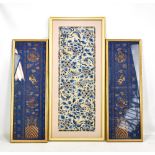 A pair of Chinese blue silk panels, each embroidered with dragon, phoenix and Dog of Fo amongst