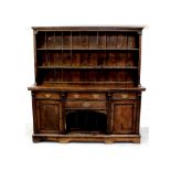 A large Edwardian oak dresser,