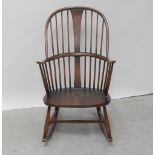 An Ercol country-style rocker in mid stained beech, height 101.5cm.