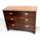 An Edwardian walnut chest of two-over-three drawers, on plinth base with later castors, width 107cm.