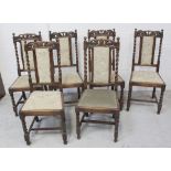 A set of six early/mid-20th century oak Carolean style barleytwist dining chairs with upholstered