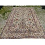 An antique Persian Tabriz carpet, 310 x 215cm.