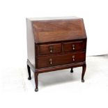 An early/mid-20th century walnut bureau,