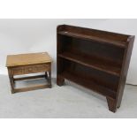 A small modern oak single-drawer side table with egg and dart carved drawer front,