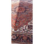 An antique Persian Heriz carpet, 351 x 259cm.