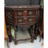 An 18th century and later Gothic oak cabinet,