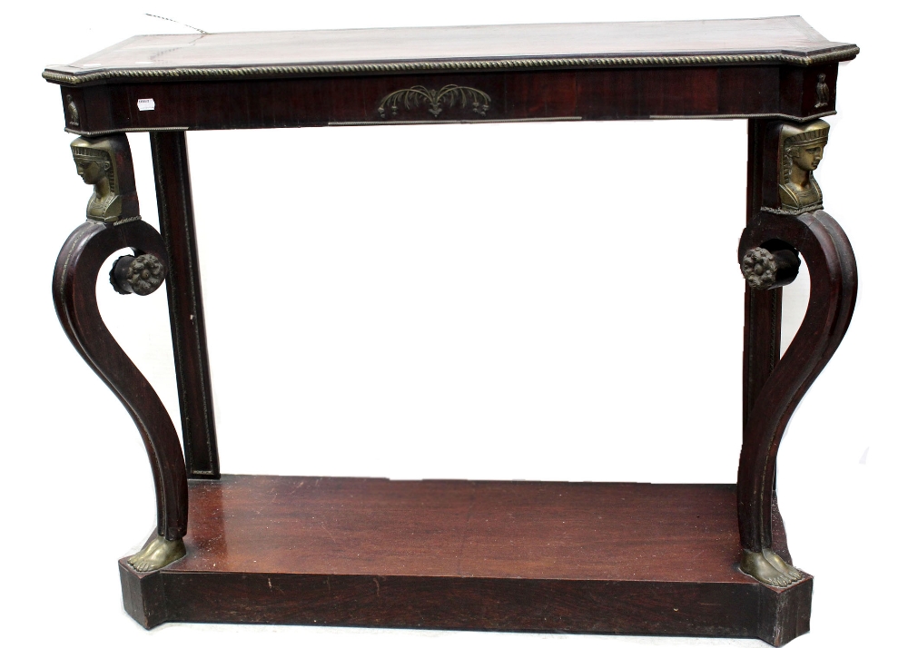 A Regency period rosewood console table with brass inlaid band to top,