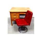 A c1970 single-pedestal three-drawer desk,