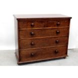 A George III plum pudding mahogany chest of two-over-three drawers with knob handles,