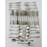 A quantity of Victorian hallmarked silver flatware to include seventeen spoons of various sizes,