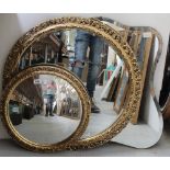 Two mid-20th century mirrors, one a shaped frameless example,