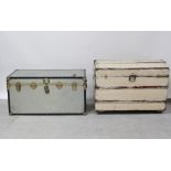 A grey covered university trunk with reinforced corners and a painted canvas arched-top coffer,