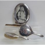 A George V hallmarked silver oval picture frame,