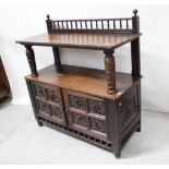 A late Victorian oak buffet with bobbin-turned gallery back and with bulbous turned shelf supports