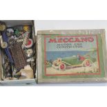 A collection of loose Meccano, colours include red, green, yellow and blues,