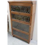 A mid-20th century Globe-Wernicke style oak four-tier bookcase,