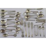 An assortment of George III and later silver flatware including salt spoons, fish knives,