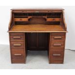 An Edwardian oak roll-top desk,