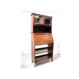 An early 20th century walnut student bureau,