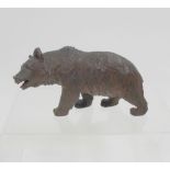 A small Black Forest bear, 6 x 13cm (af).