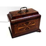 A 19th century mahogany inlaid sarcophagus tea caddy with interior lids and lead lining (lacking