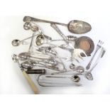 A quantity of hallmarked silver flatware to include sugar tongs, teaspoons, small ladles,