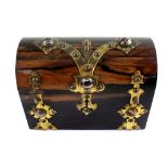 A 19th century coromandel twin-section tea caddy in the form of a treasure chest with brass