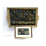 An Art Deco style tray with a Japanese silk embroidered sleeve under glass,