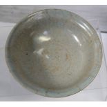 An 18th century plain glazed bowl, diameter 11.5cm.