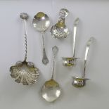 A Victorian hallmarked silver shell spoon, shell finial and bowl with applied shell decoration, G&B,