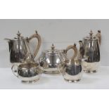 An Elizabeth II hallmarked silver five-piece tea service comprising teapot, coffee pot,