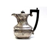 A George V hallmarked silver teapot, height 14cm, Birmingham 1927, approx 12ozt.