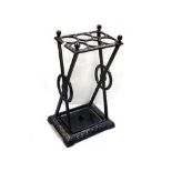 A late 19th century cast iron hall stick umbrella stand in the manner of Christopher Dresser.