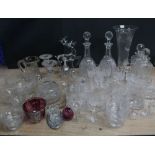 A quantity of cut glass and crystal to include a pair of decanters,