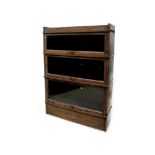 An early 20th century Simpoles chapter bookcase with three sections, 112 x 89cm.