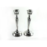 A pair of Elizabeth II hallmarked silver candlesticks, Birmingham 1975, height 16cm (2).