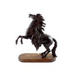 A late 19th/early 20th century bronze Marly horse after Guillaume Coustou the elder,