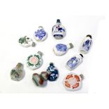 A small collection of Chinese snuff bottles to include a reverse painted glass example,