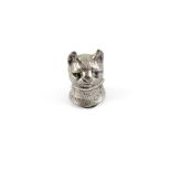 An early 20th century white metal vesta case in the form of a cat's head with striker to the base.