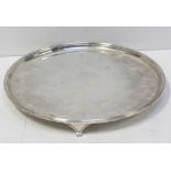 A George VI hallmarked silver salver on three supports, diameter 30cm,