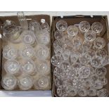 A quantity of cut glass and crystal drinking glasses to include wine glasses, sherry glasses,